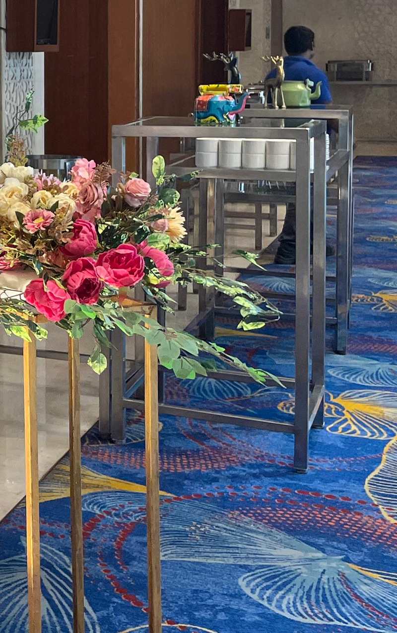 Blush and cream floral arrangement on a gold stand, engagement decoration in Jaipur by Shava Moments