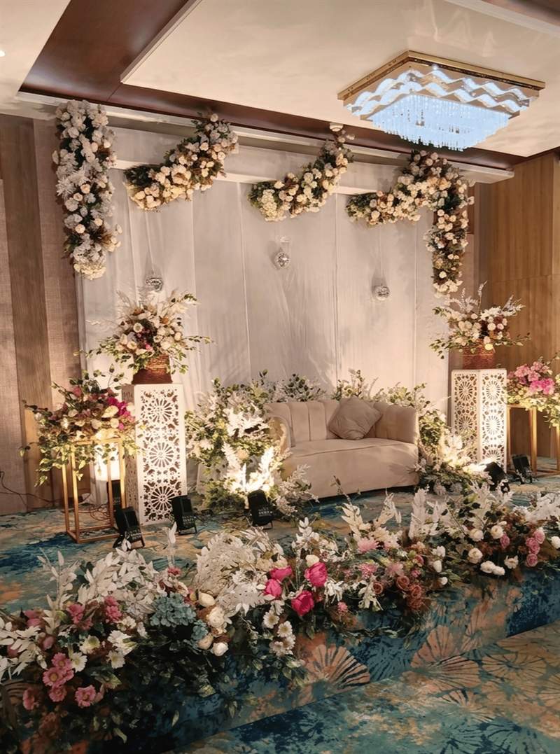 Cream and blush floral roka stage decoration in Jaipur by Shava Moments