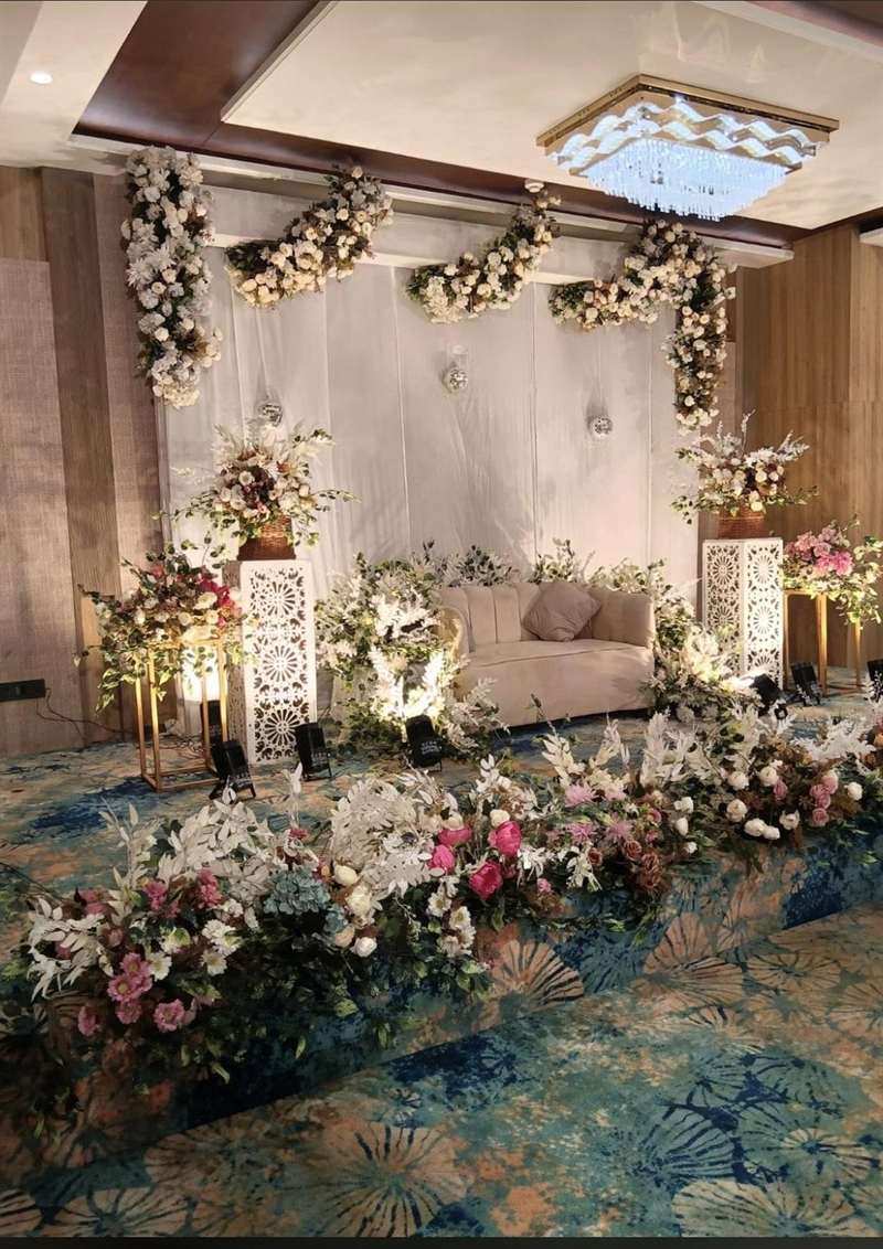 Ivory and blush floral wedding stage decoration in Jaipur by Shava Moments